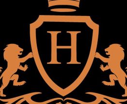An orange crest with the letter "H" and two lions on a black background.
