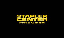 Gelbes Logo mit der Aufschrift "STAPLER CENTER Fritz GmbH" auf schwarzem Hintergrund.