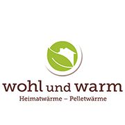 Logo mit grünem Blatt und Haus, Text: "wohl und warm - Heimatwärme, Pelletwärme".