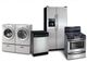 Kitchen and laundry appliances: fridge, washer, dryer, dishwasher, and oven.