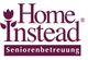 Logo von "Home Instead" mit Tulpe und dem Text "Seniorenbetreuung" in lila Farbe.