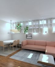 Sala moderna con sofá rosado, mesa de comedor, lámpara colgante y estantería con plantas.