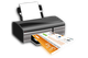 Black printer printing a colorful page with text and images.