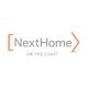 Text logo: "NextHome on the Coast" in gray, flanked by orange arrows facing right.