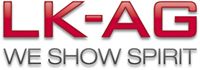 Logo der LK-AG mit dem roten Schriftzug "WE SHOW SPIRIT" darunter.