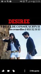 Pareja posando junto a una roca con la inscripción "DESIREE".