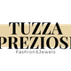 Logo con testo "Tuzza Preziosi Fashion & Jewels" su sfondo beige.