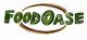 Textlogo "FOODOASE" in grünen Buchstaben, umgeben von braunen, geschwungenen Linien.