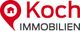 Logo von Koch Immobilien mit rotem Standort-Pin und einem Haus-Symbol.