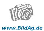 Graues Kamerasymbol über der URL "www.BildAg.de".