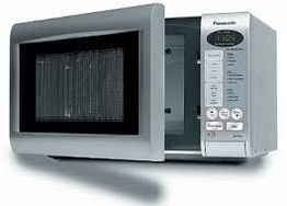 Open silver microwave with a digital display and control panel on the right.