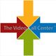 Logo with four arrows in red, yellow, green, and blue, and text "The Video Call Center."