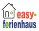 Logo mit Haus, Schriftzug "easy-ferienhaus" in bunt.
