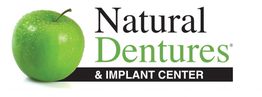 Logo of Natural Dentures & Implant Center with a green apple on the left.
