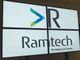 Logotipo da Ramtech, escrito "Tecnologia para Eventos", em uma tela quadriculada.