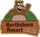 Cartoon bear waving on Northshore Resort sign at Lake Livingston.