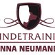 Logo mit einem Schild, Mensch-Hund-Silhouette, Text: Hundetraining Anna Neumann.