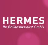 HERMES-Logo mit dem Text "Ihr Brillenspezialist GmbH" auf einem magentafarbenen Hintergrund.