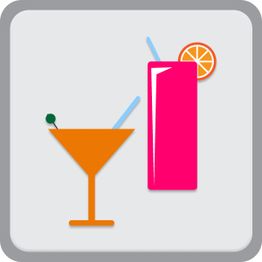 Due cocktail colorati con cannucce e una fetta d'arancia su sfondo grigio.