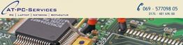 Computerplatine mit AT-PC-Services Logo und Kontaktdaten oben.