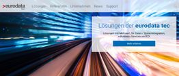 Website-Oberfläche von eurodata mit Text über Lösungen und einem Hintergrund aus Lichteffekten.