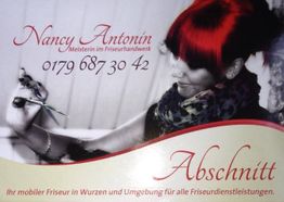 Friseurwerbung mit Frau, Schere und Telefonnummer: Mobiler Friseur in Wurzen und Umgebung.