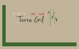 Logo de "Casa Rural Torre Gil" con diseño de líneas verdes en fondo beige.