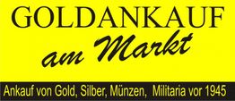 Gelbes Schild mit Text: "Goldankauf am Markt, Ankauf von Gold, Silber, Münzen, Militaria vor 1945".