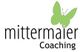 Logo von Mittermaier Coaching mit einem grünen Schmetterling über dem Schriftzug "Coaching".