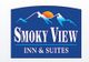 Logo of Smoky View Inn & Suites with mountains and a sun in the background.