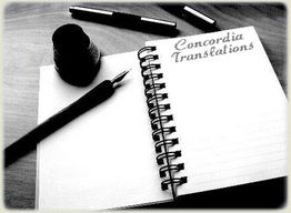 Notizbuch mit Füllfederhalter, Tintenflasche und "Concordia Translations" auf der Seite.