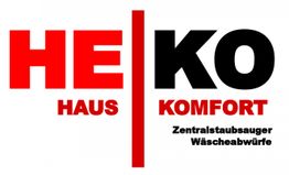 Textlogo: "HEKO Haus Komfort", darunter "Zentralstaubsauger Wäscheabwürfe" in Schwarz und Rot.