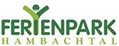 Logo mit grünem Schriftzug "FERIENPARK HAMBACHTAL" und schematischer Figur oben links.