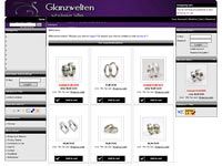 Website mit Schmuckkatalog, zeigt verschiedene Ohrringe mit Preisen auf einem weißen Hintergrund.