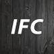 "White 'IFC' text on a dark wood plank background."
