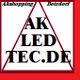 Dreieck mit Schrift: "AK LED TEC.DE", oben "AKshopping Betzdorf", roter Rand.