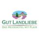 Logo von "Gut Landliebe" mit dem Text "Das Heidehotel mit Flair" und Naturmotiv.