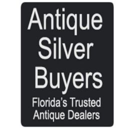 Sign reads: "Antique Silver Buyers, Florida's Trusted Antique Dealers."