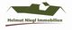 Logo von Helmut Niegl Immobilien mit grünem Haus und Schriftzug darunter.