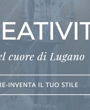 Schaufenster in Lugano mit Text: "KREATIVITÄT im Herzen von Lugano" und "Gestalte deinen Stil neu".