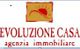 Logo di agenzia immobiliare "EVOLUZIONE CASA" con disegno di sole stilizzato.