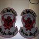 Two identical patches labeled "B.Wild's Auto Repair" with a flaming skull and crossed wrenches design.