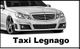 Auto bianca con scritto "Taxi Legnago" sotto.