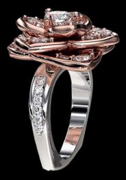 Rose-shaped ring with diamonds set in silver and rose gold, on a black background.