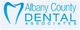 Logo of Albany County Dental Associates with a tooth graphic on the left.