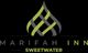 Marifah Inn Sweetwater logo with intertwined green and black ribbons on a black background.
