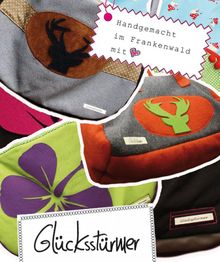 Handgemachte Filztaschen mit Hirsch- und Kleeblattmotiven aus dem Frankenwald von Glücksstürmer.