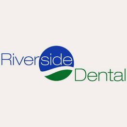 Logo of Riverside Dental with blue and green text and a circular design.