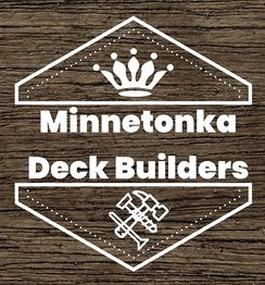 "Logo of Minnetonka Deck Builders with a crown and crossed tools on a wood background."