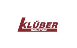 Logo mit rotem "KLÜBER INDUSTRIE"-Text auf weißem Hintergrund.